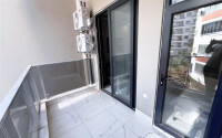 Apartment 1+1 in a new building with furniture and appliances in Mahmutlar-id-8966-photo-7