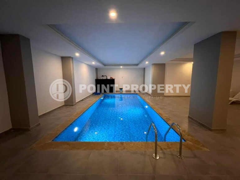 Apartment 1+1 in a new building with furniture and appliances in Mahmutlar-id-8966-photo-8