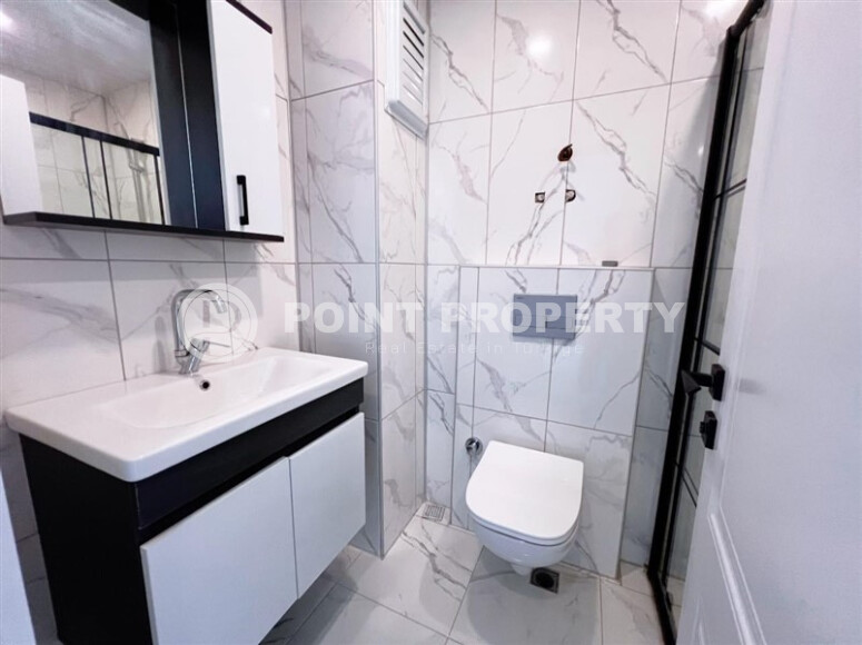 Apartment 1+1 in a new building with furniture and appliances in Mahmutlar-id-8966-photo-10