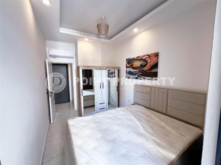Apartment 1+1 in a new building with furniture and appliances in Mahmutlar-id-8966-photo-12