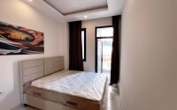 Apartment 1+1 in a new building with furniture and appliances in Mahmutlar-id-8966-photo-13