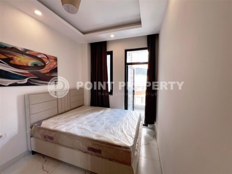 Apartment 1+1 in a new building with furniture and appliances in Mahmutlar-id-8966-photo-13