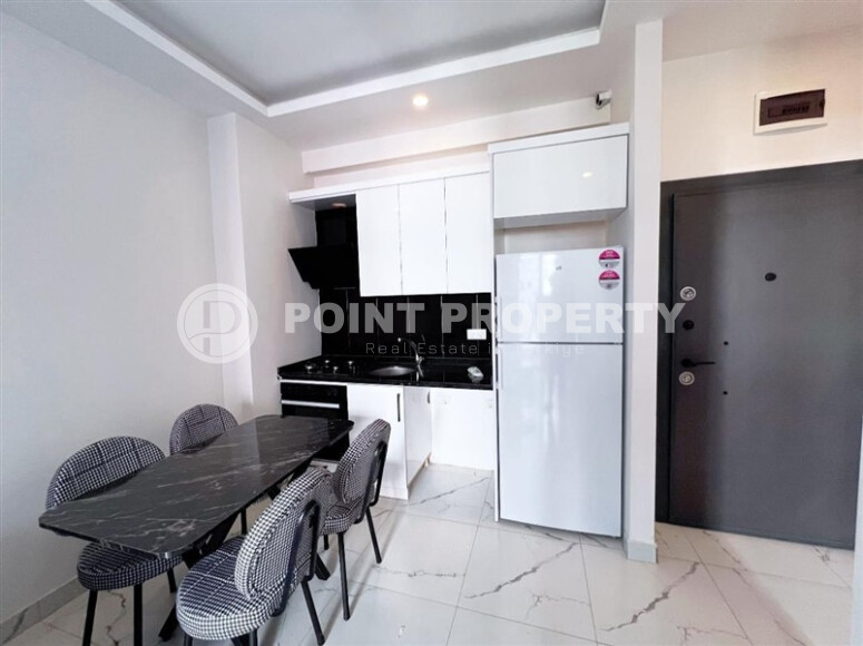 Apartment 1+1 in a new building with furniture and appliances in Mahmutlar-id-8966-photo-14