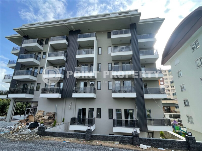 Apartment 1+1 in a new building with furniture and appliances in Mahmutlar-id-8966-photo-17