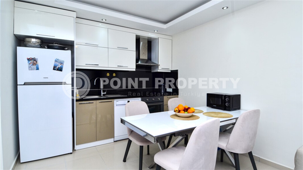 Квартира 1+1 большой площади с открытым видом в Махмутларе-id-8981-фото-4