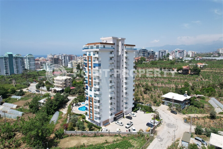 Квартира 1+1 большой площади с открытым видом в Махмутларе-id-8981-фото-16