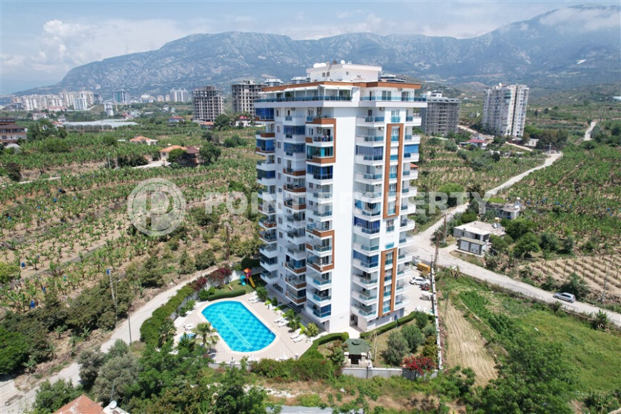 Квартира 1+1 большой площади с открытым видом в Махмутларе-id-8981-фото-17