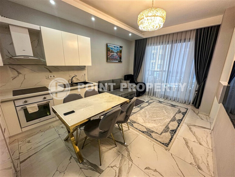 Продается уютная квартира 1+1 площадью 50 м2 в районе Махмутлар недалеко от пляжа с мебелью и техникой-id-8983-фото-2