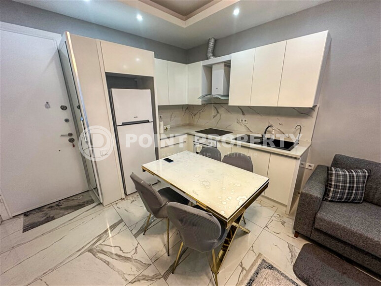 Продается уютная квартира 1+1 площадью 50 м2 в районе Махмутлар недалеко от пляжа с мебелью и техникой-id-8983-фото-4