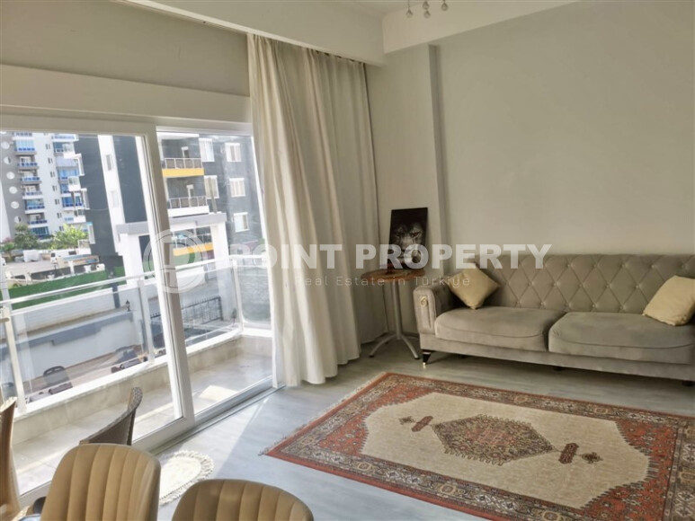 Недорогая квартира в новом доме района Махмутлар-id-8985-фото-2