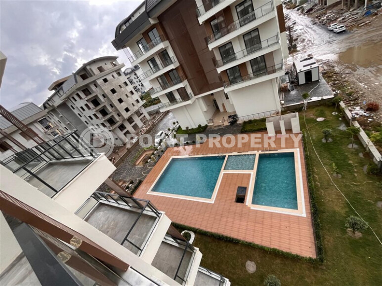 Новый проект в Каргыджаке от надежной строительной компании всего в 280 метрах от известного пляжа. 56-143 кв.м.-id-1207-фото-34