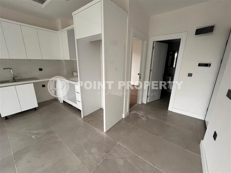 Новый проект в Каргыджаке от надежной строительной компании всего в 280 метрах от известного пляжа. 56-143 кв.м.-id-1207-фото-35