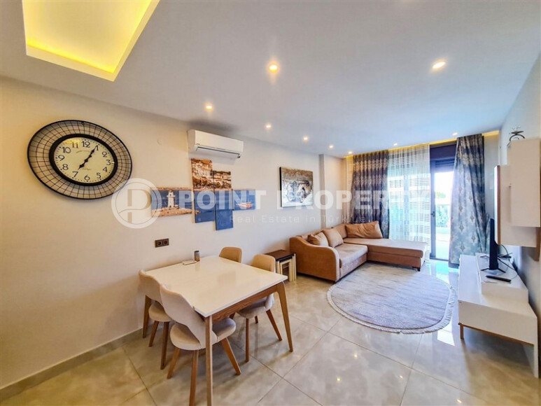 Стильная квартира 60 м² на первой линии в Махмутларе-id-8995-фото-2