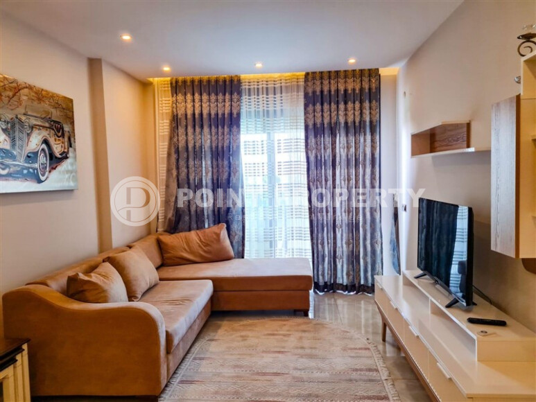 Стильная квартира 60 м² на первой линии в Махмутларе-id-8995-фото-3