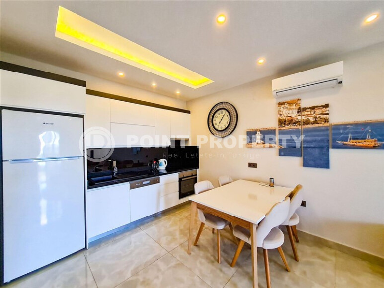 Стильная квартира 60 м² на первой линии в Махмутларе-id-8995-фото-6