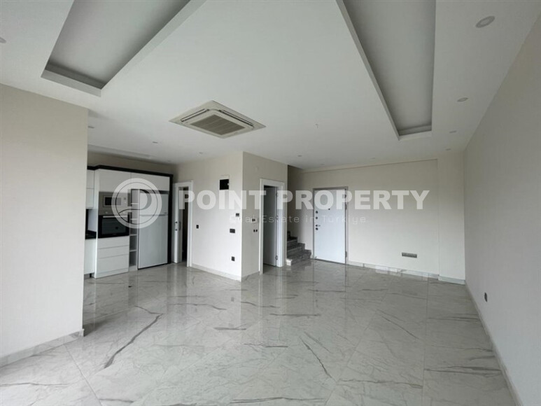 Просторный дуплекс 140 м² с видом на море и ВНЖ в районе Гюллерпынары, Аланья-id-9000-фото-3