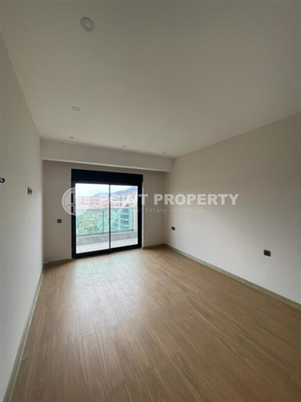 Просторный дуплекс 140 м² с видом на море и ВНЖ в районе Гюллерпынары, Аланья-id-9000-фото-5