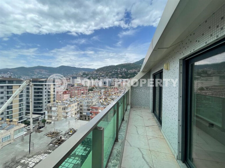 Просторный дуплекс 140 м² с видом на море и ВНЖ в районе Гюллерпынары, Аланья-id-9000-фото-14