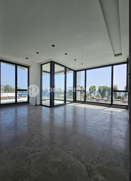 Новая квартира 100 м² на первой линии в районе Каргыджак-id-9004-фото-2