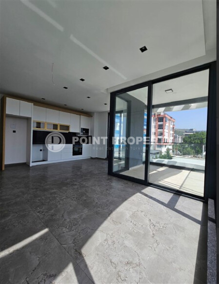 Новая квартира 100 м² на первой линии в районе Каргыджак-id-9004-фото-4