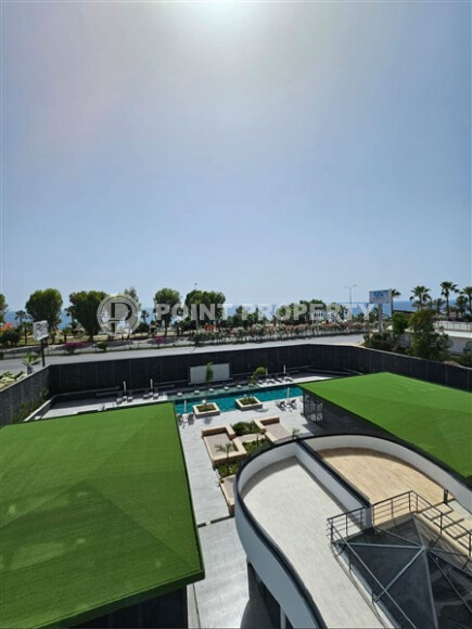 Новая квартира 100 м² на первой линии в районе Каргыджак-id-9004-фото-17