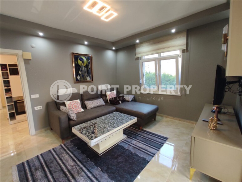 Уютная квартира 55 м² на проспекте Барбароса в Махмутларе-id-9011-фото-2