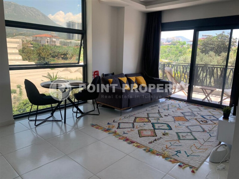 Квартира 50 м² в современном комплексе района Махмутлар-id-9017-фото-4