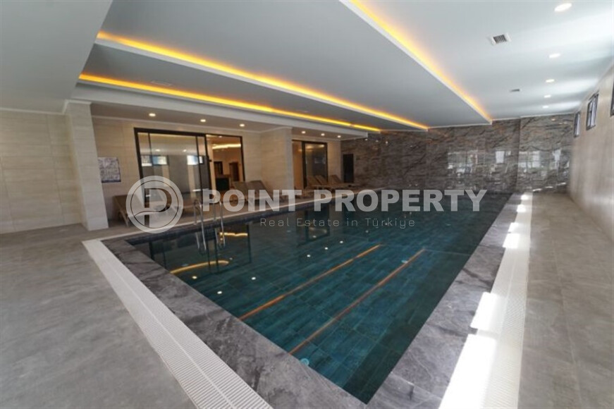 Квартира 50 м² в современном комплексе района Махмутлар-id-9017-фото-15