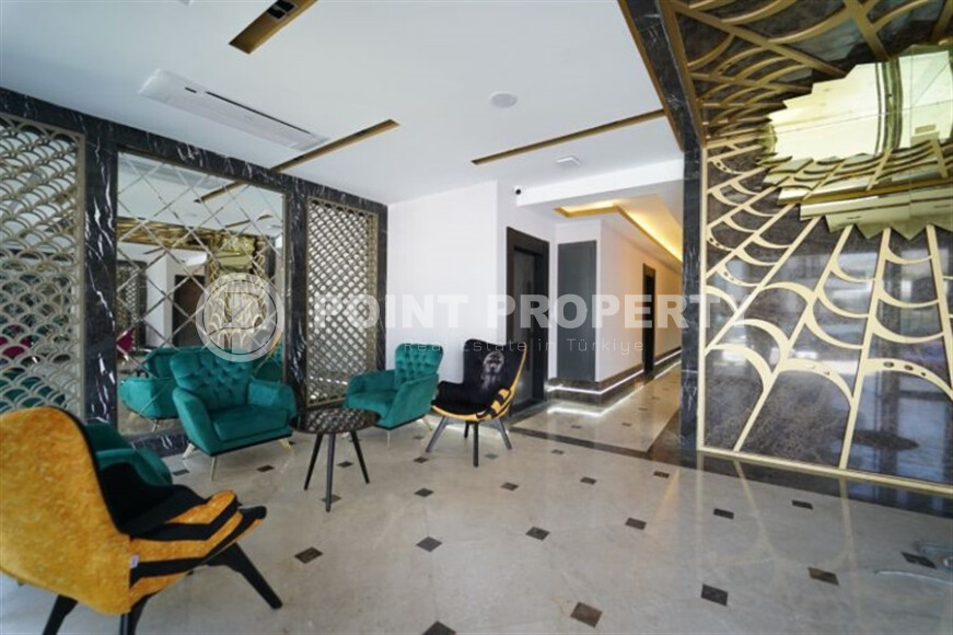 Квартира 50 м² в современном комплексе района Махмутлар-id-9017-фото-17