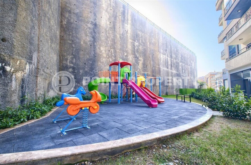 Квартира 50 м² в современном комплексе района Махмутлар-id-9017-фото-24