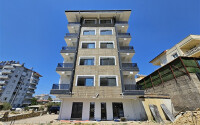 Современная квартира 53 м² на солнечной стороне в Авсалларе-id-9042-фото-1
