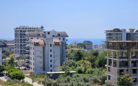 Современная квартира 53 м² на солнечной стороне в Авсалларе-id-9042-фото-9