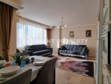 Просторная квартира 115 м² с развитой инфраструктурой в Махмутларе-id-9045-фото-2