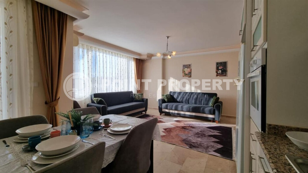 Просторная квартира 115 м² с развитой инфраструктурой в Махмутларе-id-9045-фото-2