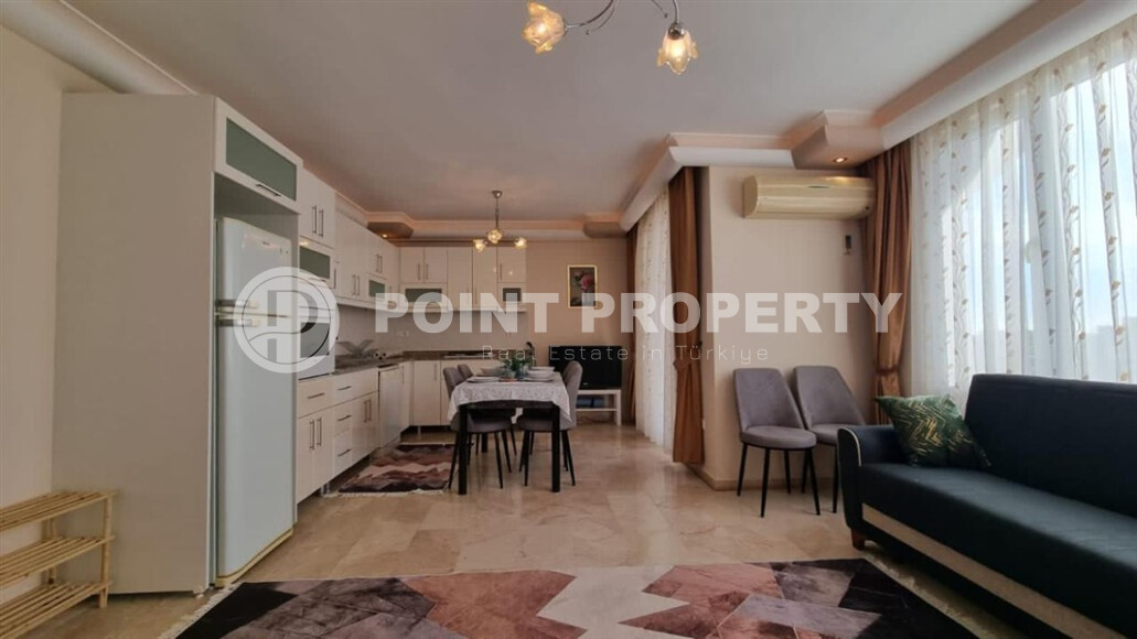 Просторная квартира 115 м² с развитой инфраструктурой в Махмутларе-id-9045-фото-3