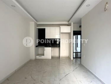 Современная квартира 50 м² с развитой инфраструктурой в Махмутларе-id-9049-фото-2