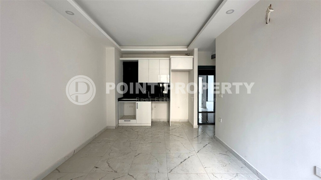 Современная квартира 50 м² с развитой инфраструктурой в Махмутларе-id-9049-фото-2