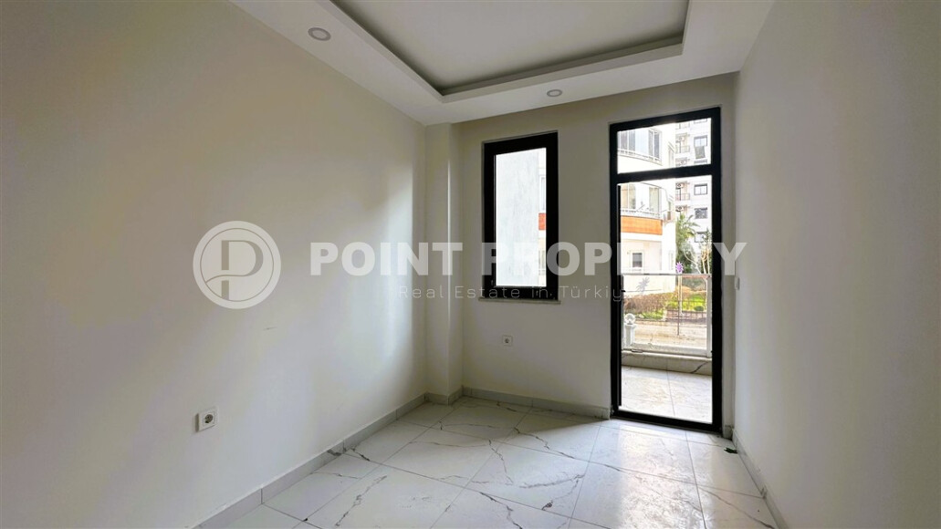 Современная квартира 50 м² с развитой инфраструктурой в Махмутларе-id-9049-фото-3