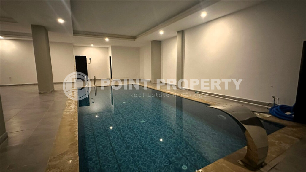 Современная квартира 50 м² с развитой инфраструктурой в Махмутларе-id-9049-фото-7