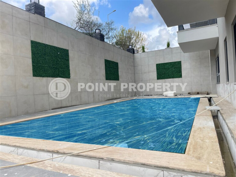 Современная квартира 50 м² с развитой инфраструктурой в Махмутларе-id-9049-фото-11