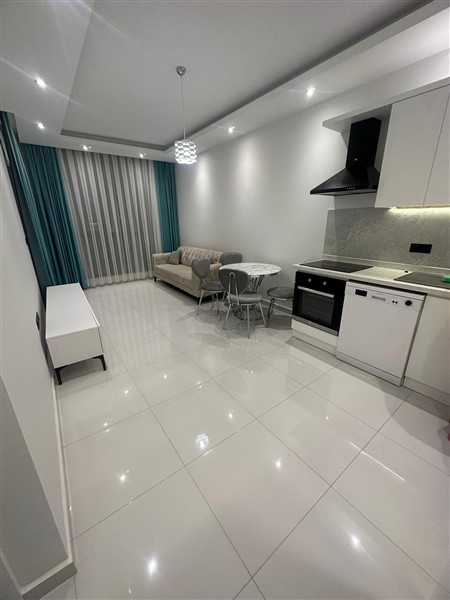 Bright apartment 50 m² in the center of Alanya, near the sea-id-9050-photo-1