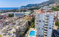 Spacious apartment 115 m² in the center of Alanya with sea view and residence permit-id-9052-photo-1