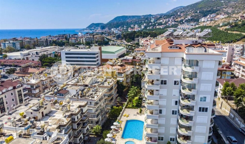 Spacious apartment 115 m² in the center of Alanya with sea view and residence permit-id-9052-photo-1