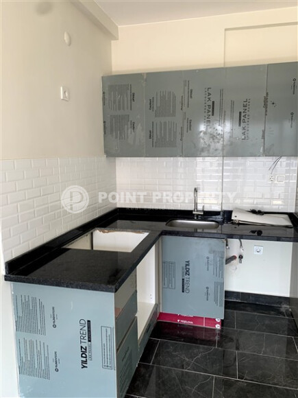 Новая квартира 47 м² в районе Махмутлар, с удобствами для активного отдыха-id-9065-фото-2