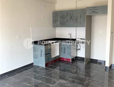 Новая квартира 47 м² в районе Махмутлар, с удобствами для активного отдыха-id-9065-фото-3