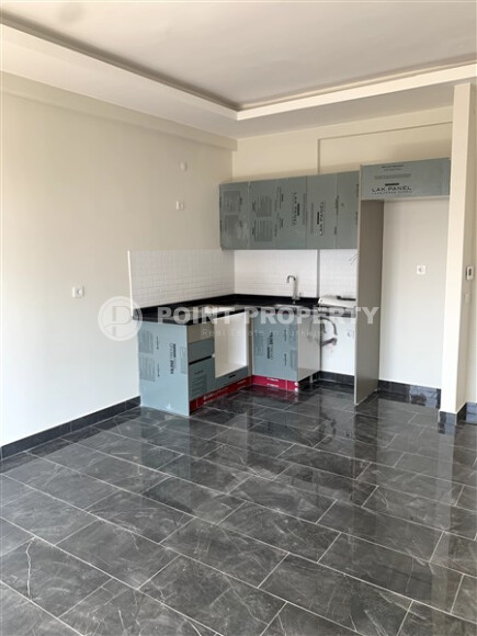 Новая квартира 47 м² в районе Махмутлар, с удобствами для активного отдыха-id-9065-фото-3