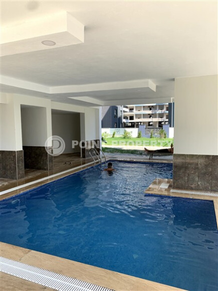 Новая квартира 47 м² в районе Махмутлар, с удобствами для активного отдыха-id-9065-фото-13