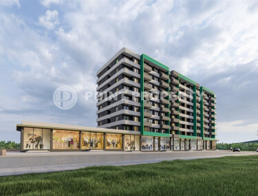 Новый проект от надежного застройщика - комплекс с комфортными квартирами 53 м² и 92 м² в Мерсине, в 550 метрах от моря-id-9100-фото-2