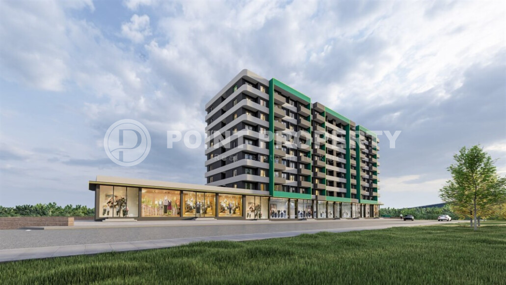 Новый проект от надежного застройщика - комплекс с комфортными квартирами 53 м² и 92 м² в Мерсине, в 550 метрах от моря-id-9100-фото-2