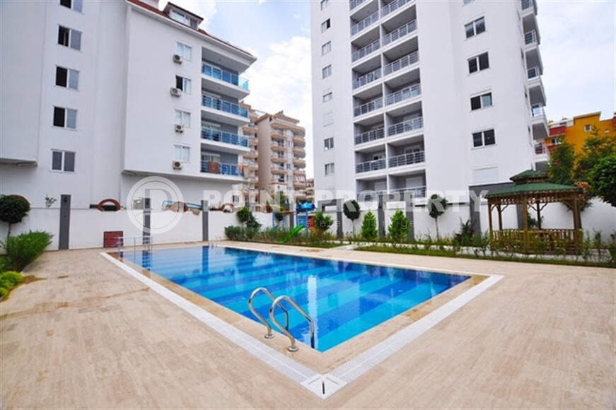 Уютная квартира с двумя спальнями в Махмутларе-id-9130-фото-9